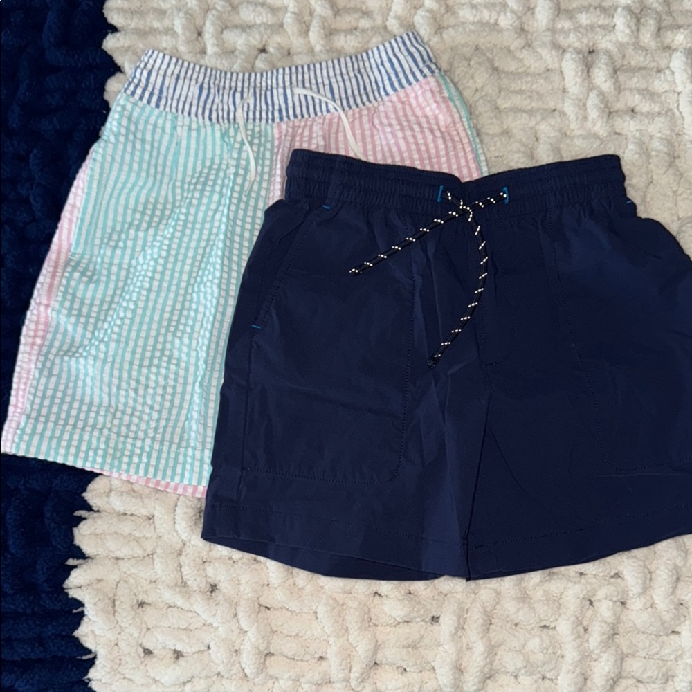 (2) pairs of boys EUC JCREW swim trunks size 8. Multi-colored seersucker & navy